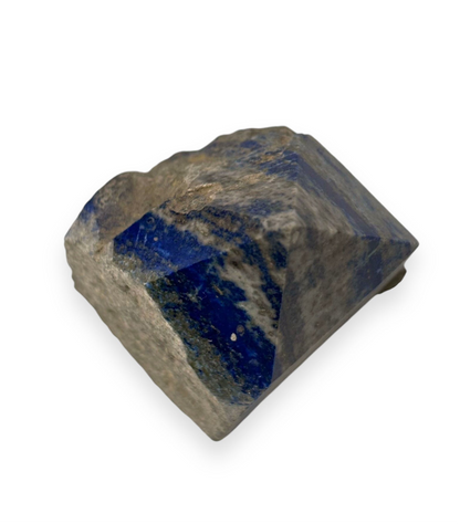 Lapis Lazuli top polished point crystal, showcasing its size and smooth finish, known for enhancing clarity and truth.