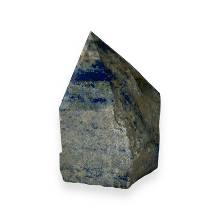 Close-up view of a polished Lapis Lazuli crystal point, highlighting its deep blue color and intricate gold flecks, known for enhancing wisdom and inner peace.