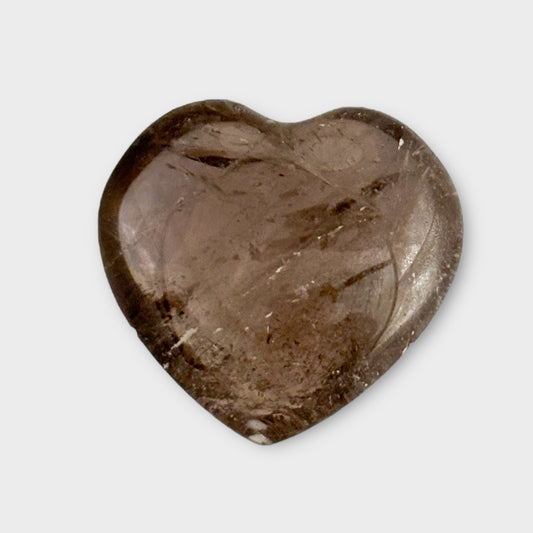 A polished Smoky Quartz Pocket Stone displayed on a white background, emphasizing its smooth, glossy surface and rich brown tones.