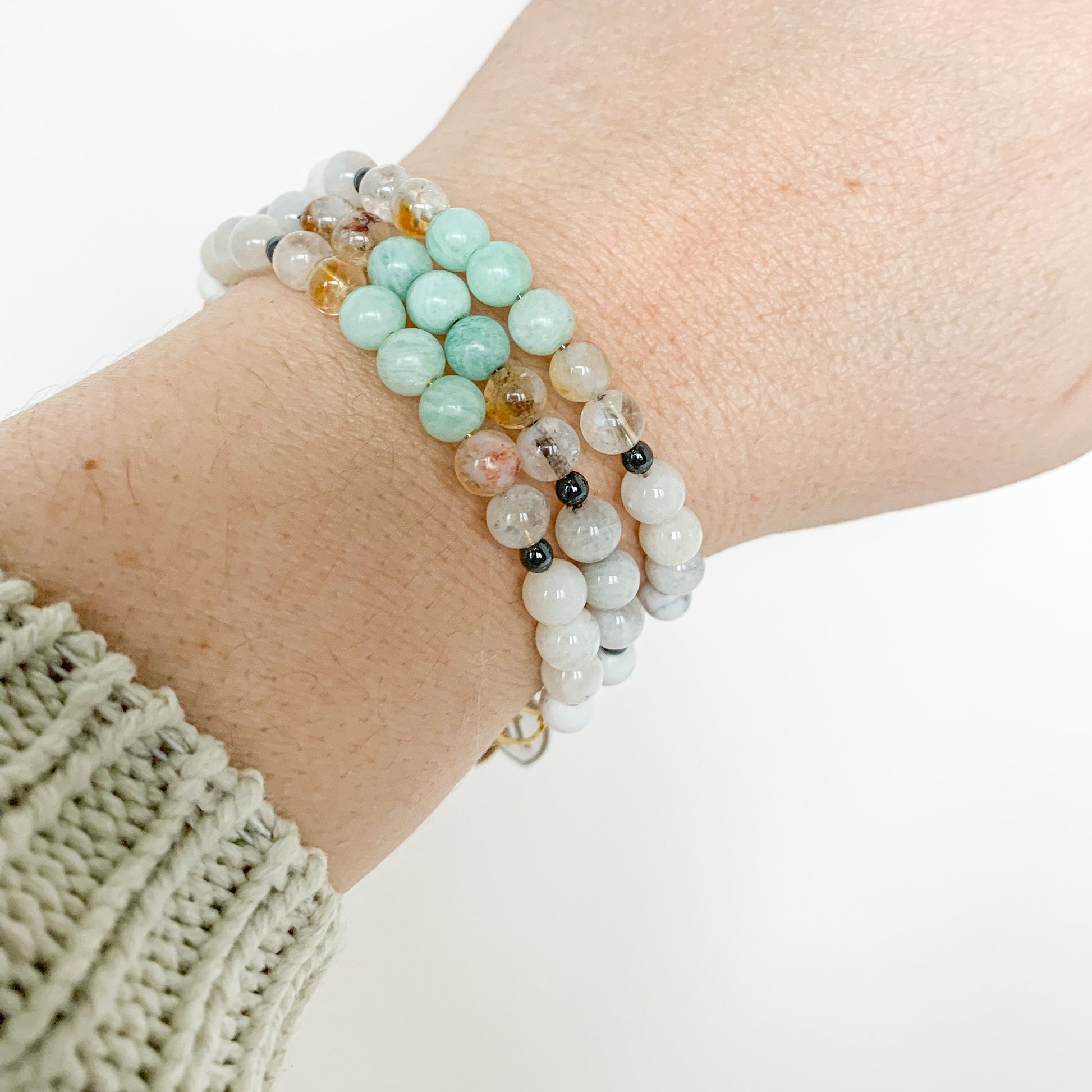 Stack of Gemini Bracelets, illustrating the blend for empowerment and style.